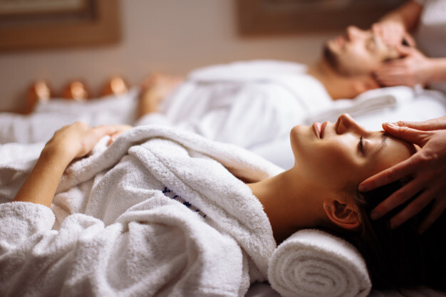 happy-young-beautiful-couple-enjoying-head-massage-spa_183219-10 (1)